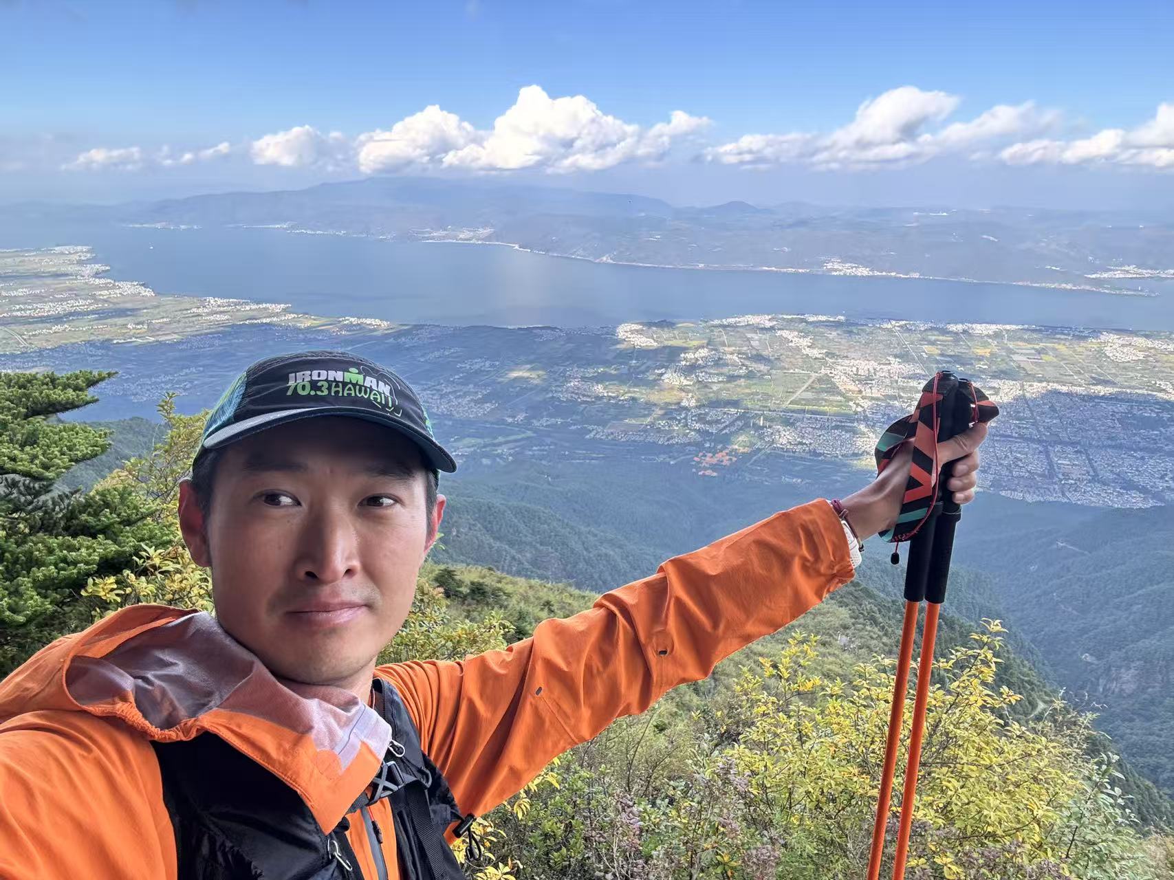 Marshal outdoors in the mountains above a lake
